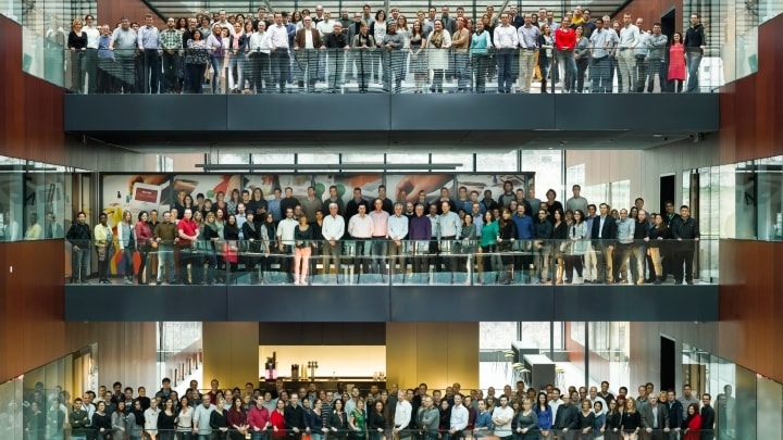 Group photo of PMI Scientists in Cube, Neuchatel.