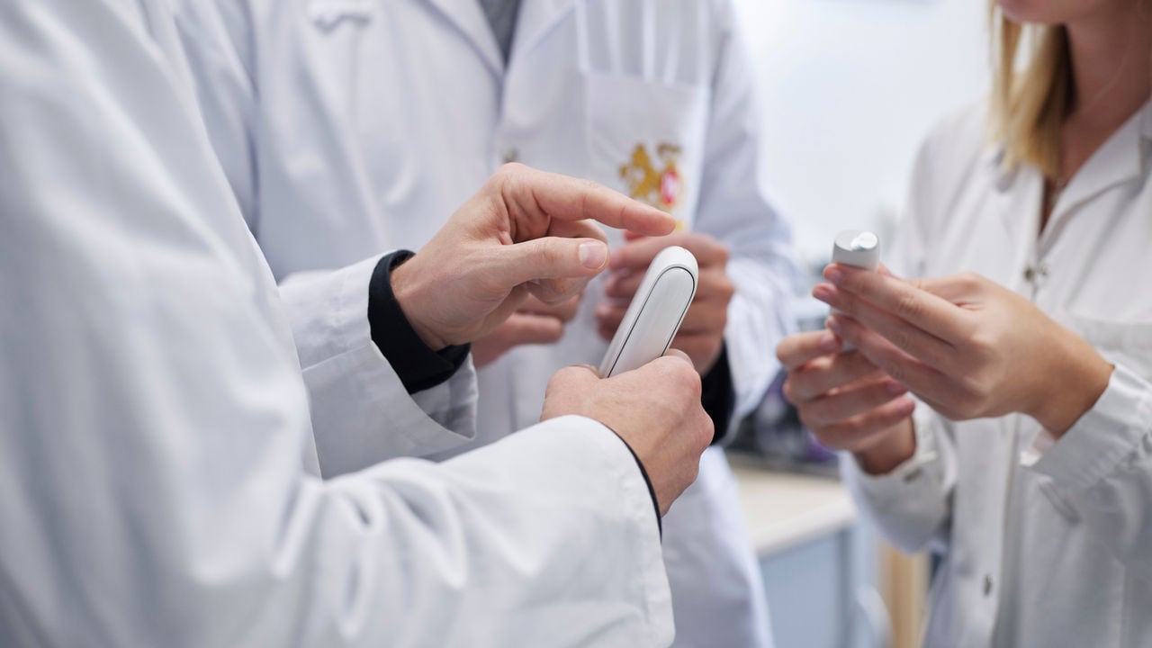Scientist hands with smoke free products