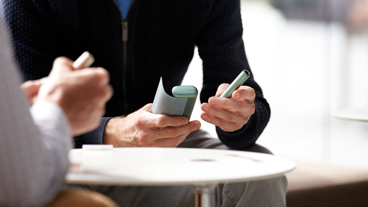 People with PMI smoke free products in hands