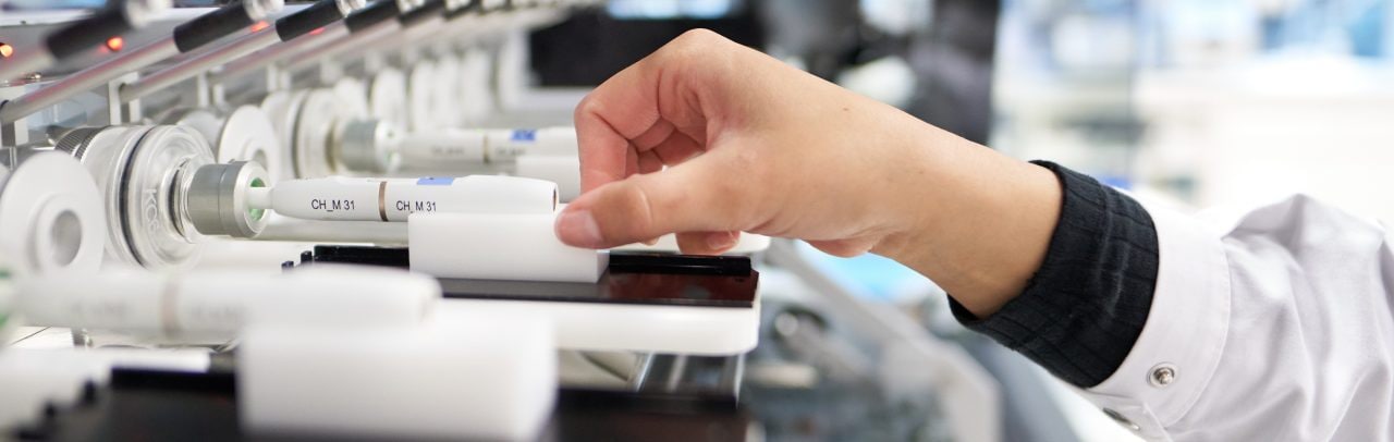 Scientist hand working with smoke free devices in laboratory